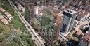 Les blocs de TOR Finance City et leur environnement vert, vue aérienne (image de synthèse)