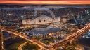 Vue aérienne de nuit : le lac et les axes routiers illuminés (rendu 3D)