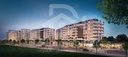 Immeubles de l’avenue commerçante éclairés au crépuscule (rendu 3D)